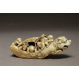 An early 19th century Japanese netsuke form Meiji period. Signed Komin