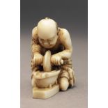 A mid 19th century Japanese netsuke from Edo period. Signed Tomochika