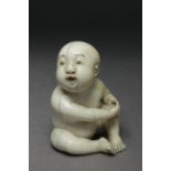 A 19th century Japanese netsuke from Edo period. Signed Tokugyoko