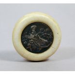 A 19th century Japanese kagamibuta netsuke from Meiji period