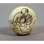 A 19th century Japanese manju type netsuke from Meiji period