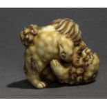 An early 19th century Japanese netsuke from Edo period. Signed Tomochika