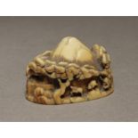 A late 19th century Japanese netsuke from Meiji period. Signed