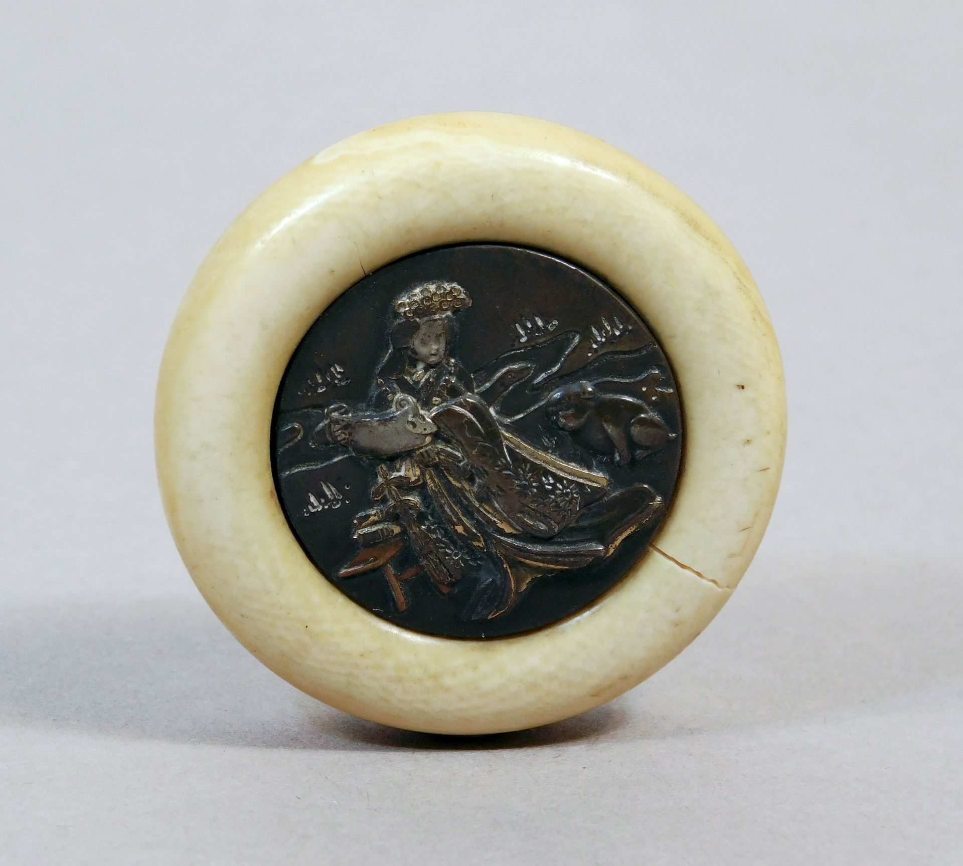 A 19th century Japanese kagamibuta netsuke from Meiji period