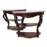 A pair of Victorian style mahogany console tables circa 1930