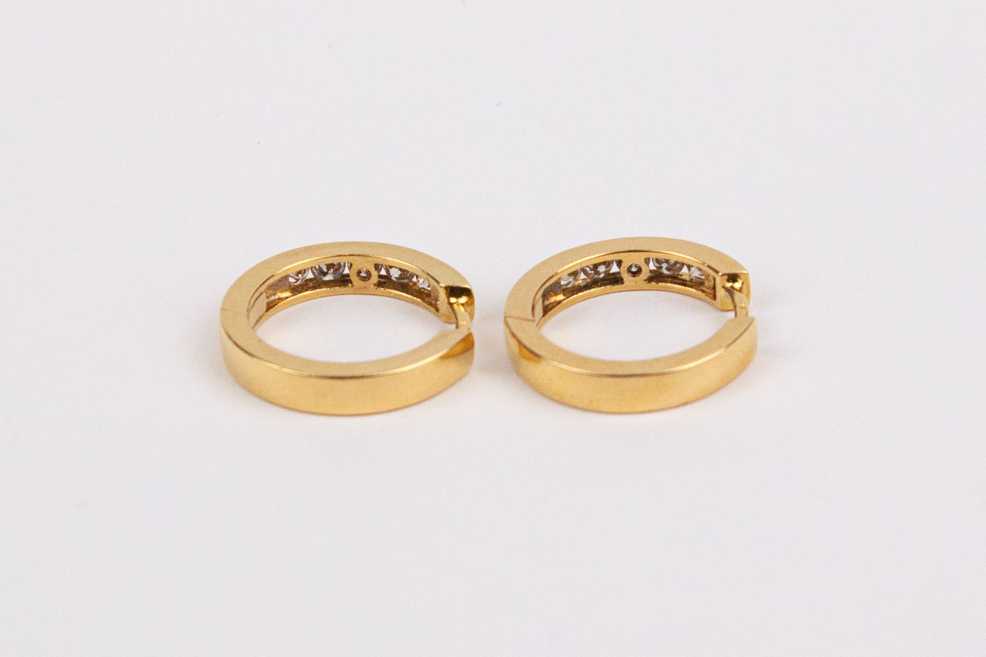 A pair od¡f 18k. Yellow gold and diamonds hoop earrings - Image 2 of 2