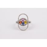 An 18k. yellow gold, sapphires and diamonds ring