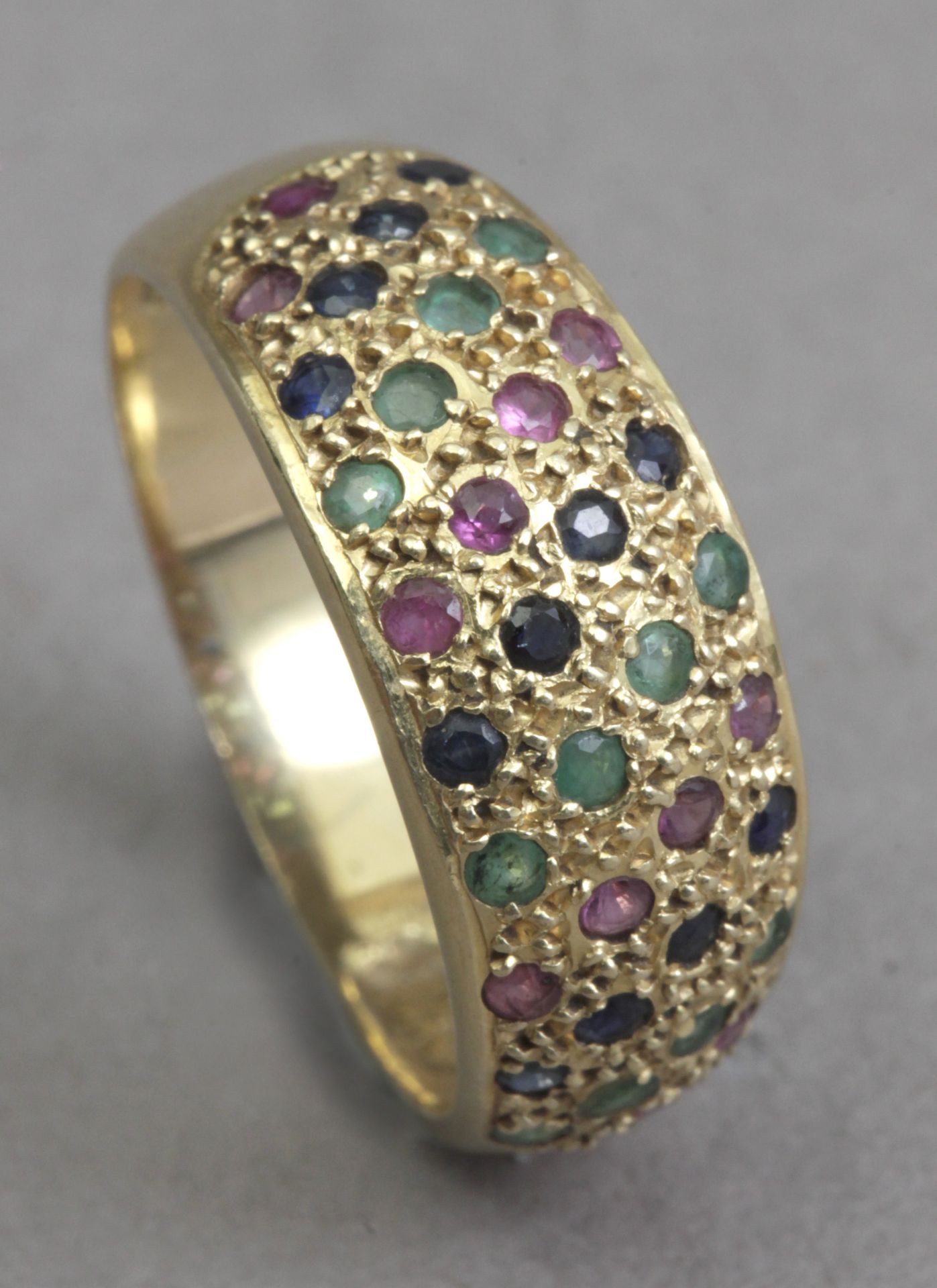 An 18k. Yellow gold, diamonds, emerald and rubies bombe ring - Image 2 of 6