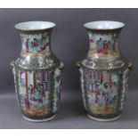 A pair of 19th century Chinese Canton Famille Rose porcelain vases from Qing dynasty