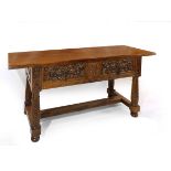 A 20th century Castilian style walnut table