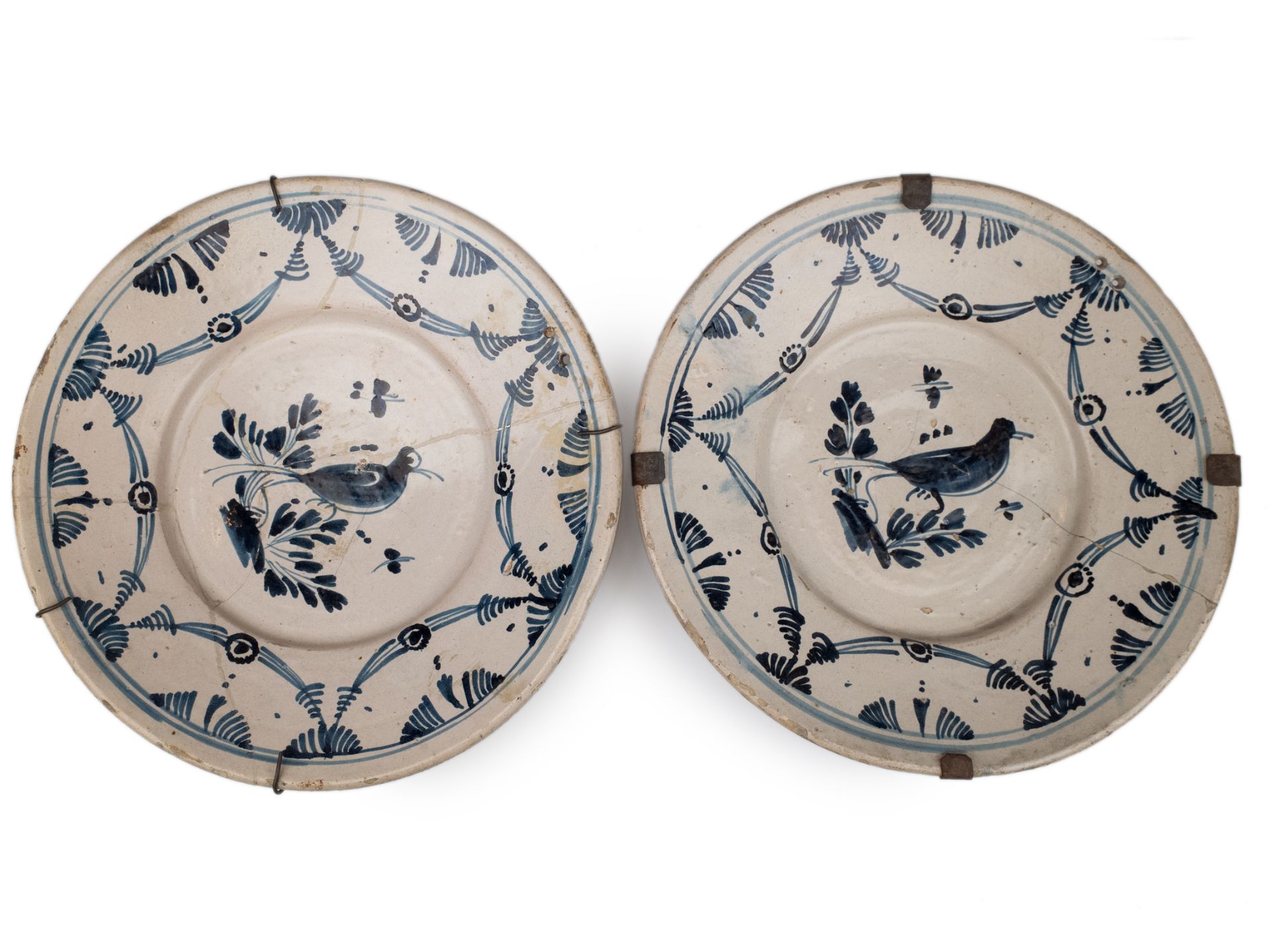 A pair of late 18th century plates in Catalan pottery of 'l'arracada'