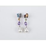 A pair of long earrings. 18k., white gold, topaz from Brazil, diamonds and cultured pearls