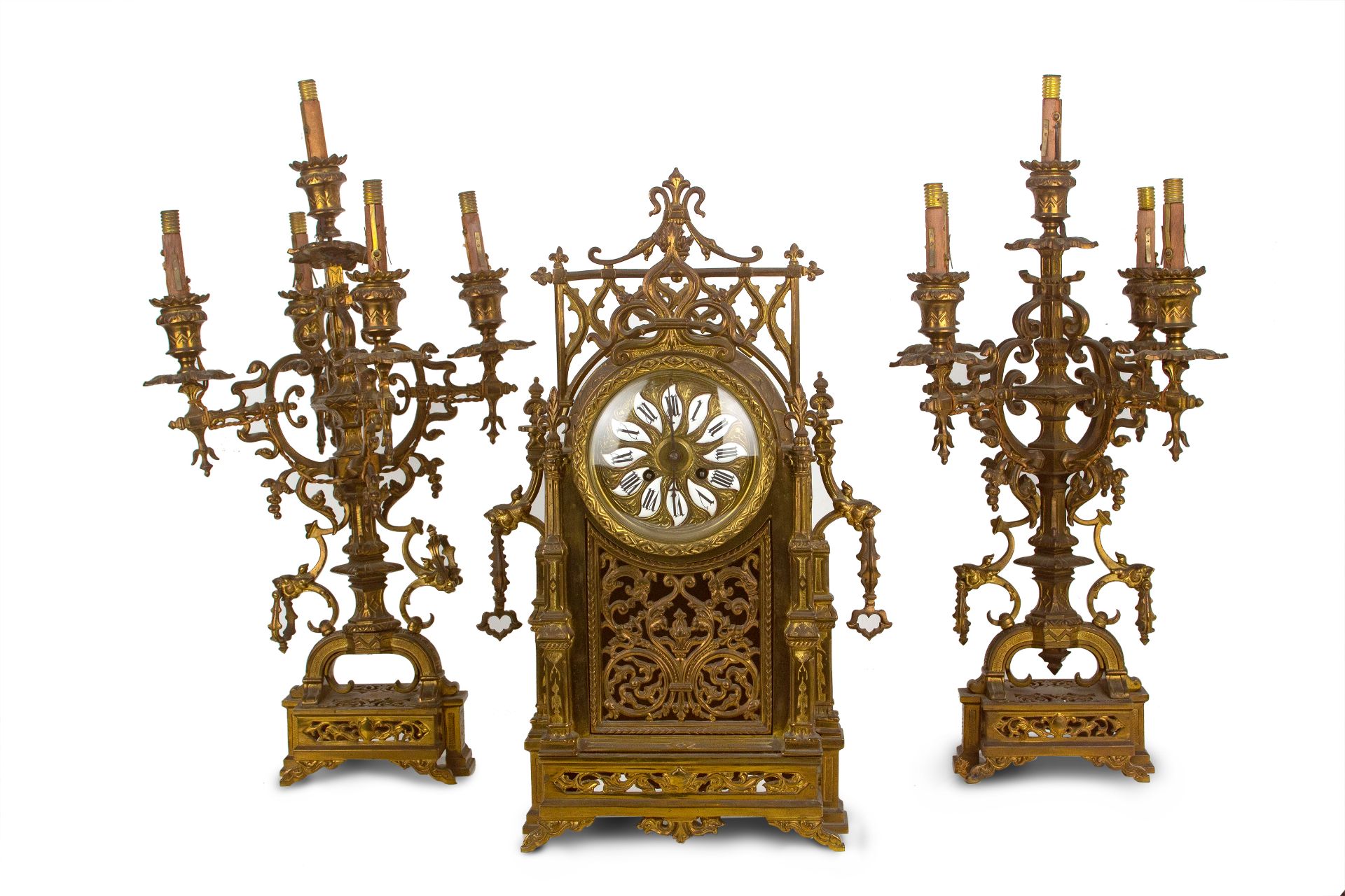 A 19th century bronze skeleton mantel clock and garrison
