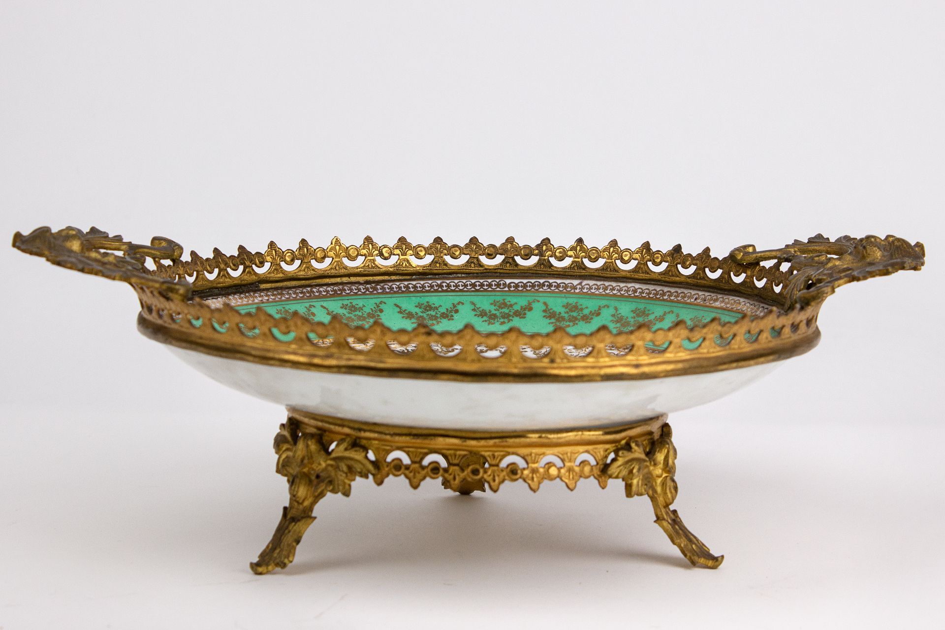 A first half of 20th century French centrepiece in Sévres style porcelain with a bronze garniture