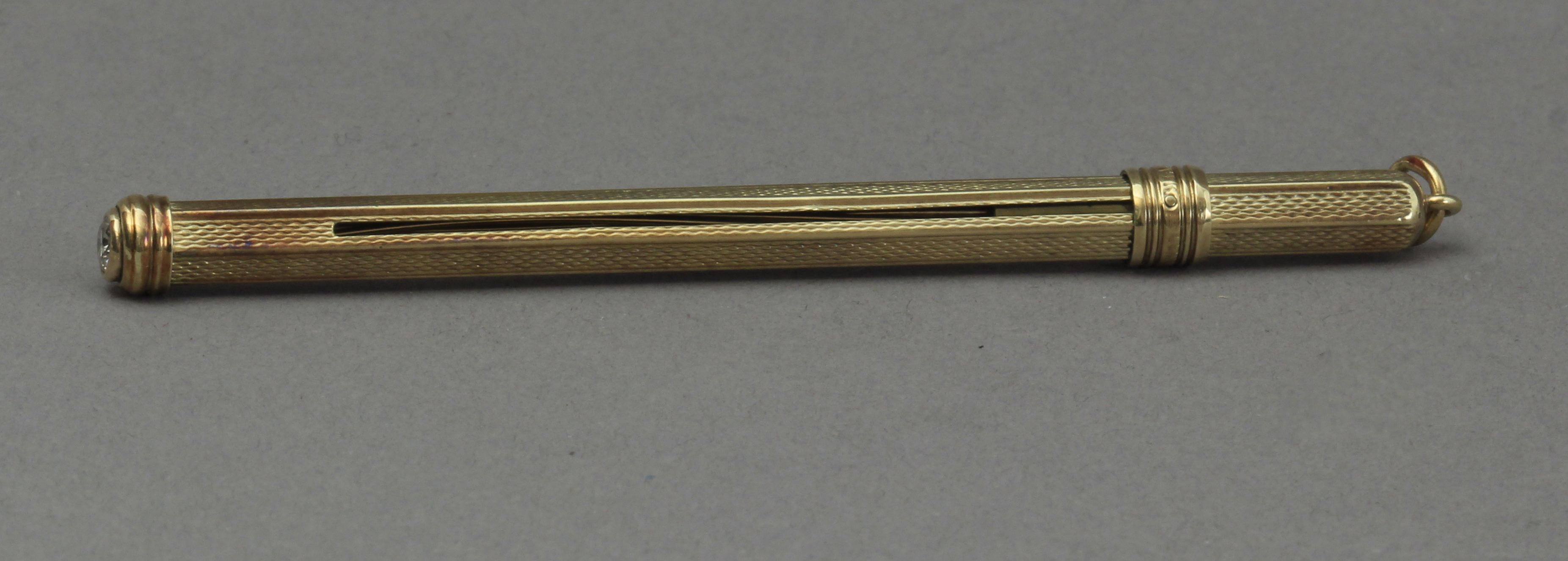 A mid 20th century 14k. gold and diamond cocktail mixer tool - Image 2 of 2