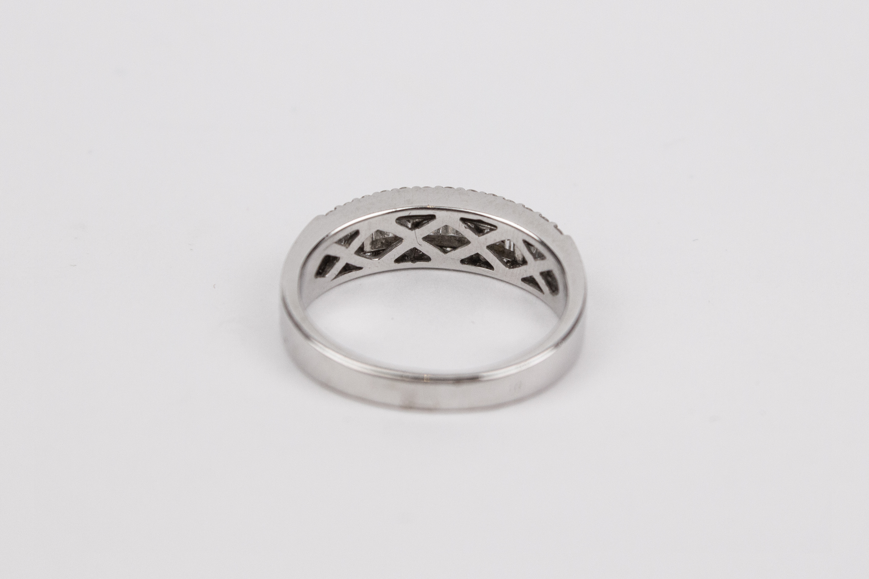 An 18k. white gold and diamonds half eternity ring - Image 2 of 2