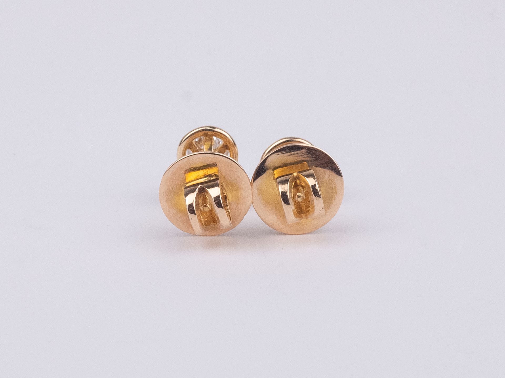 A pair of 18k. yellow gold and diamond stud earrings - Image 2 of 2