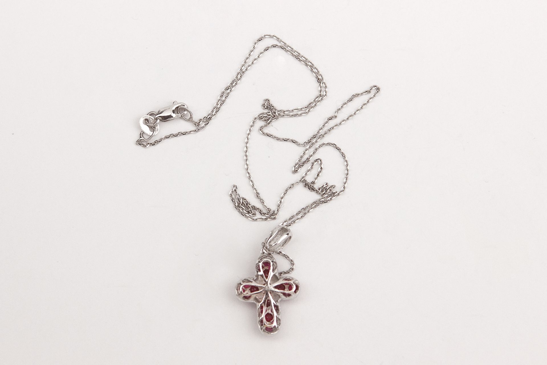An 18k. white gold and rubies pendant cross and chain - Image 2 of 2
