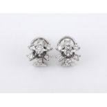 A pair of 18k. white gold and diamonds cluster earrings circa 1970-1980