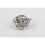 A platinum and brilliant cut diamonds cluster ring circa 1970-1979