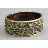 Possibly Fuset I Grau. A late 19th century bangle in 18k. yellow gold and tortoiseshell