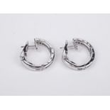Chimento. A pair of 18k., white gold and diamonds hoop earrings