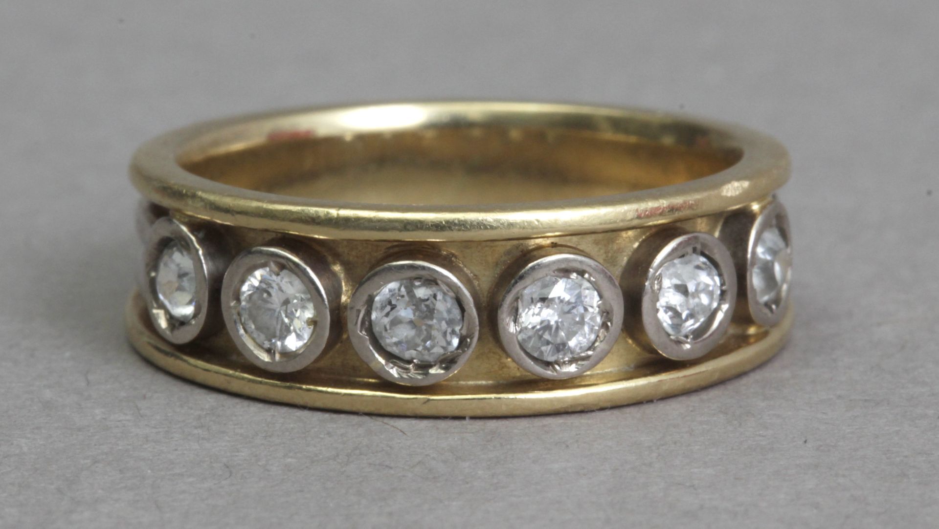 A first half of 20th century old cut diamonds half eternity ring