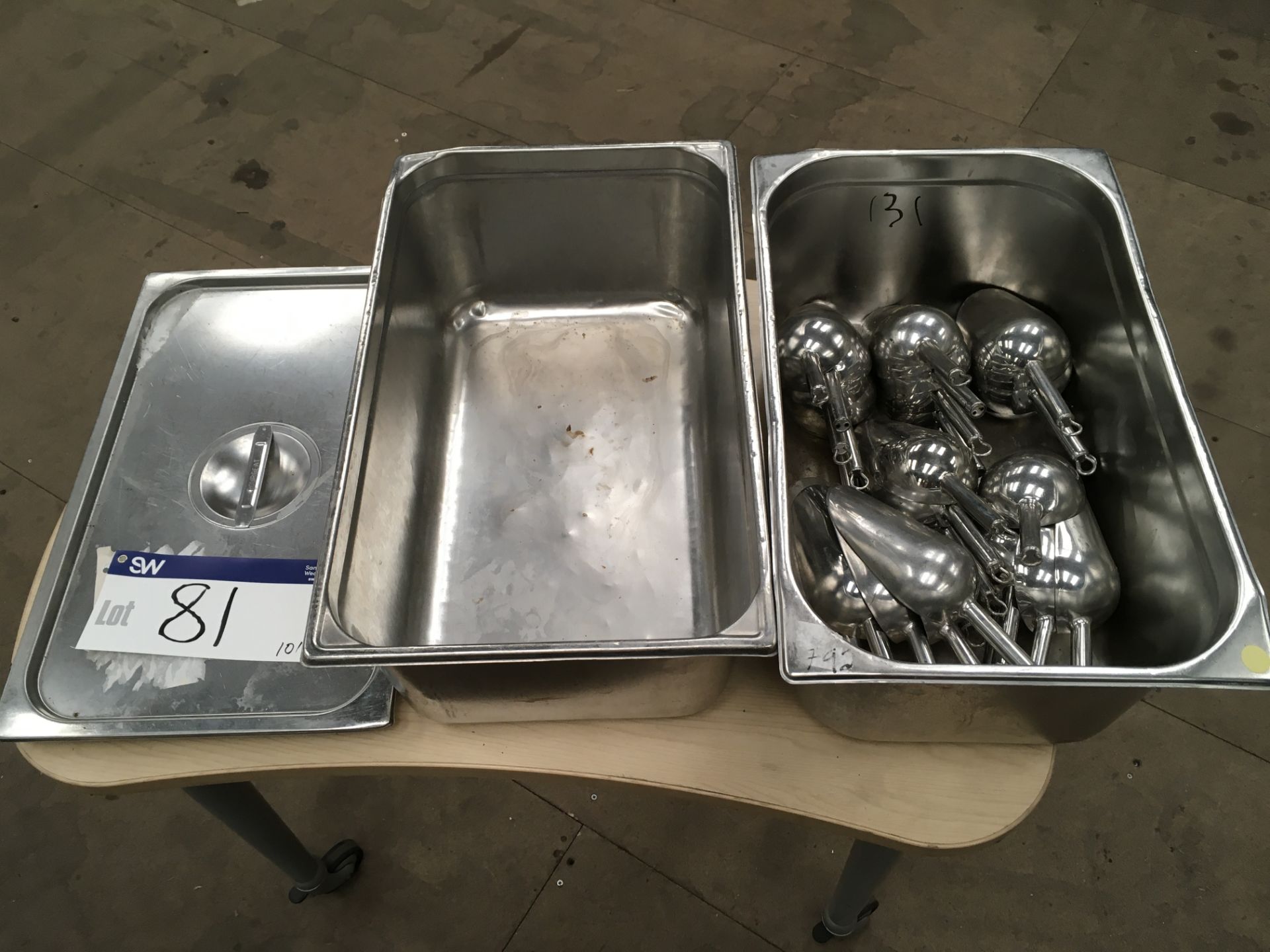 Two Stainless Steel Trays, with 20 stainless steel scoops, serial no. N/A, plant no. N/A, year of