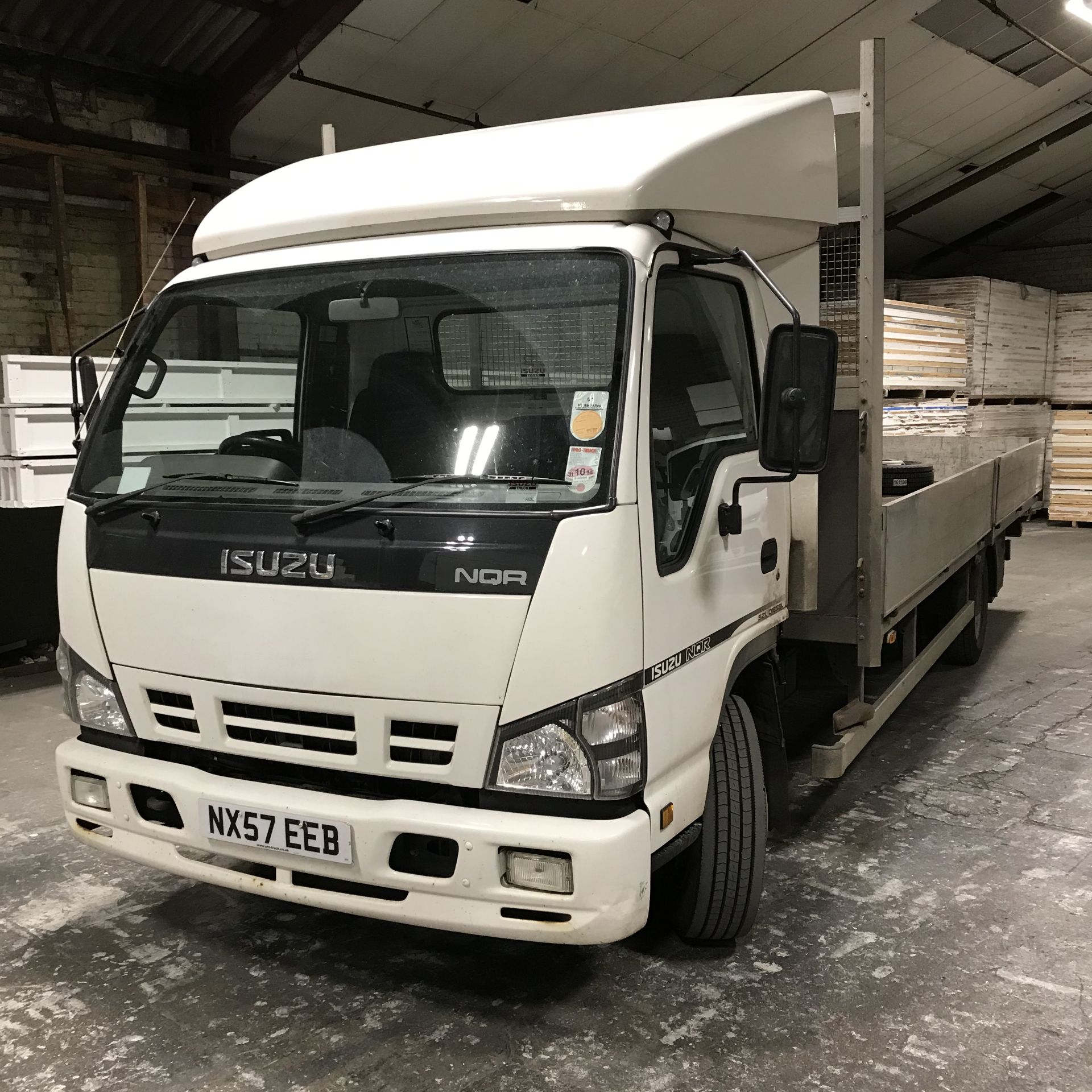 Isuzu NQR-7 Rigid Body Dropside Lorry, platform si - Image 2 of 6