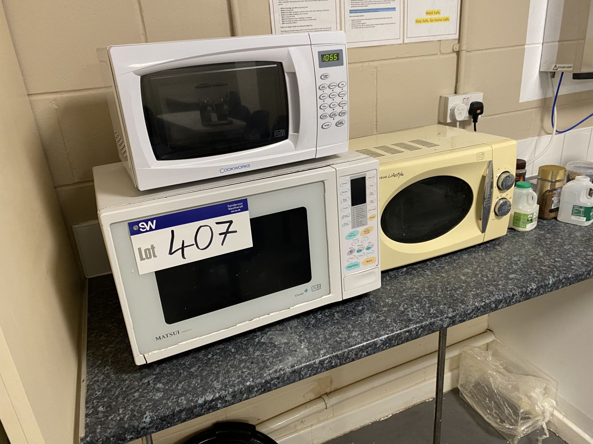 Three Microwave Ovens