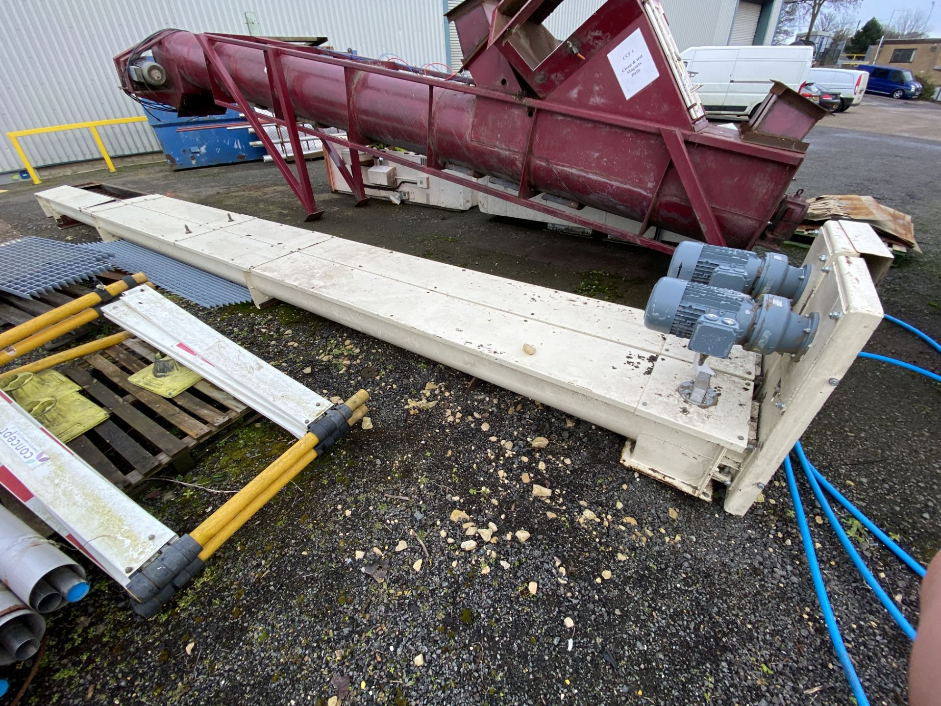 Guttridge 250MM DIA. SCREW CONVEYOR, approx. 8.25m long, with geared electric motor drive and one