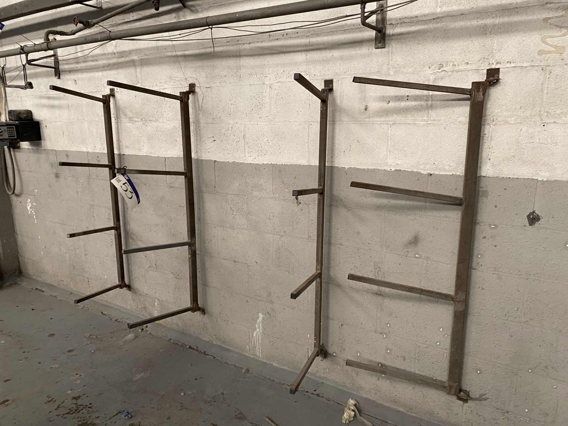 Three Steel Wall Mounted Stock Racks