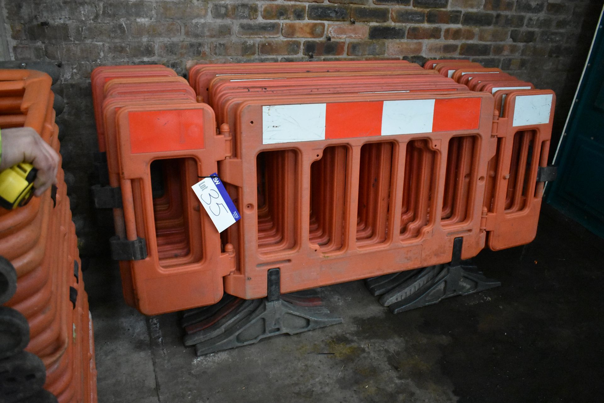 Ten Hinged Panel Plastic Barriers, each approx. 2m long overall