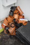Assorted Plastic Pipe Fittings, as set out in corner of room