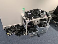 Approx. 58 YEOLINK Telephone Handsets (Located at