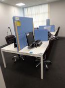 Bank of eight inter-connected desks comes with fou