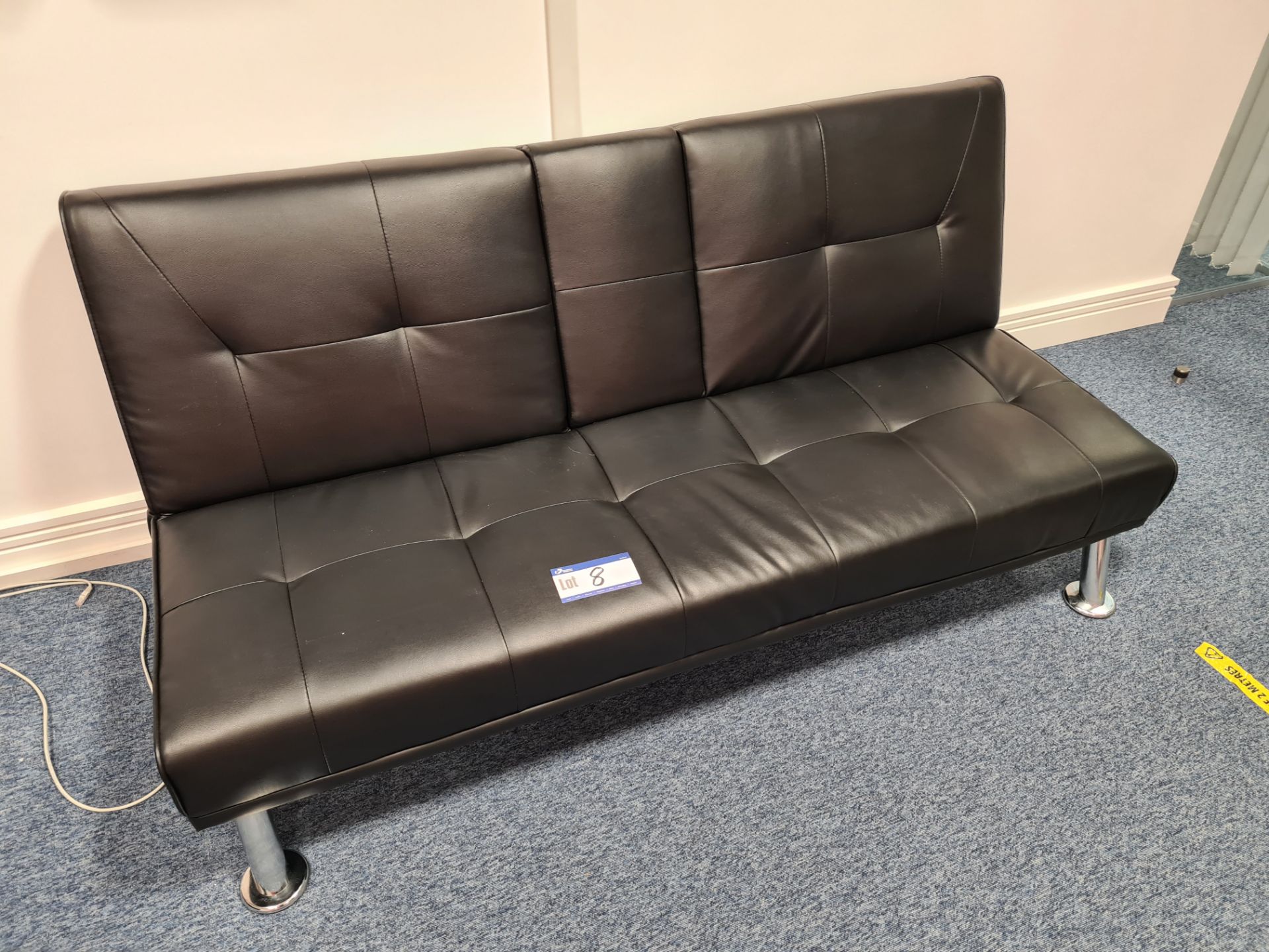 Black Leather settee (Located at Q2 Light Box, Quo