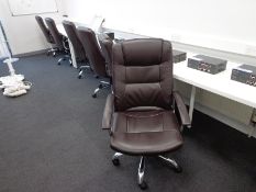 Seven brown leather effect swivel office chairs (T