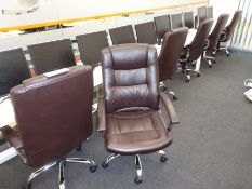 Seven brown leather effect swivel office chairs (T