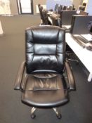 Five black leather effect swivel office chairs (Th