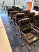 Ten Black leather swivel armchairs (Located at Q2