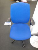 Blue upholstered swivel office chair and two hat a