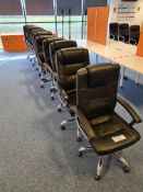 Ten Black leather swivel armchairs (Located at Q2