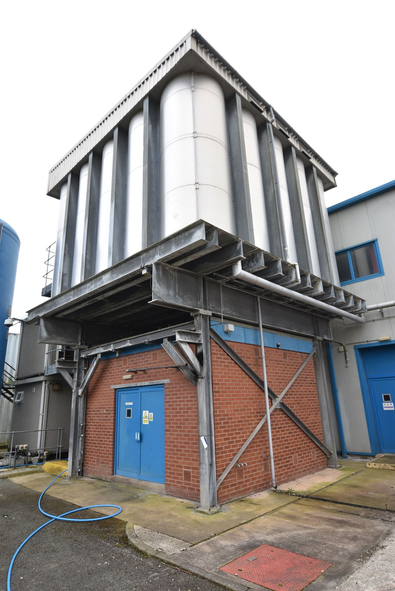 BOLTED MODULAR ALLOY WATER STORAGE TANK, approx. 6.7m x 6.7m x 5m high, with galvanised steel