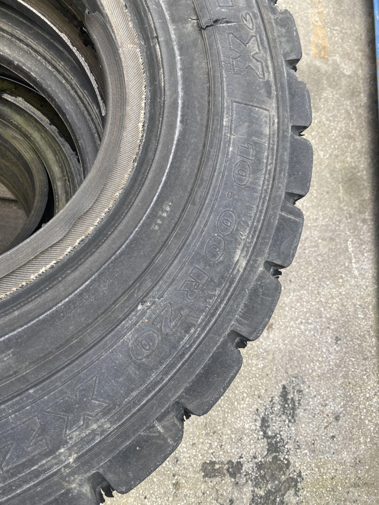 Three 10.00 R 20 Tyres, as set out in stack - Image 3 of 3