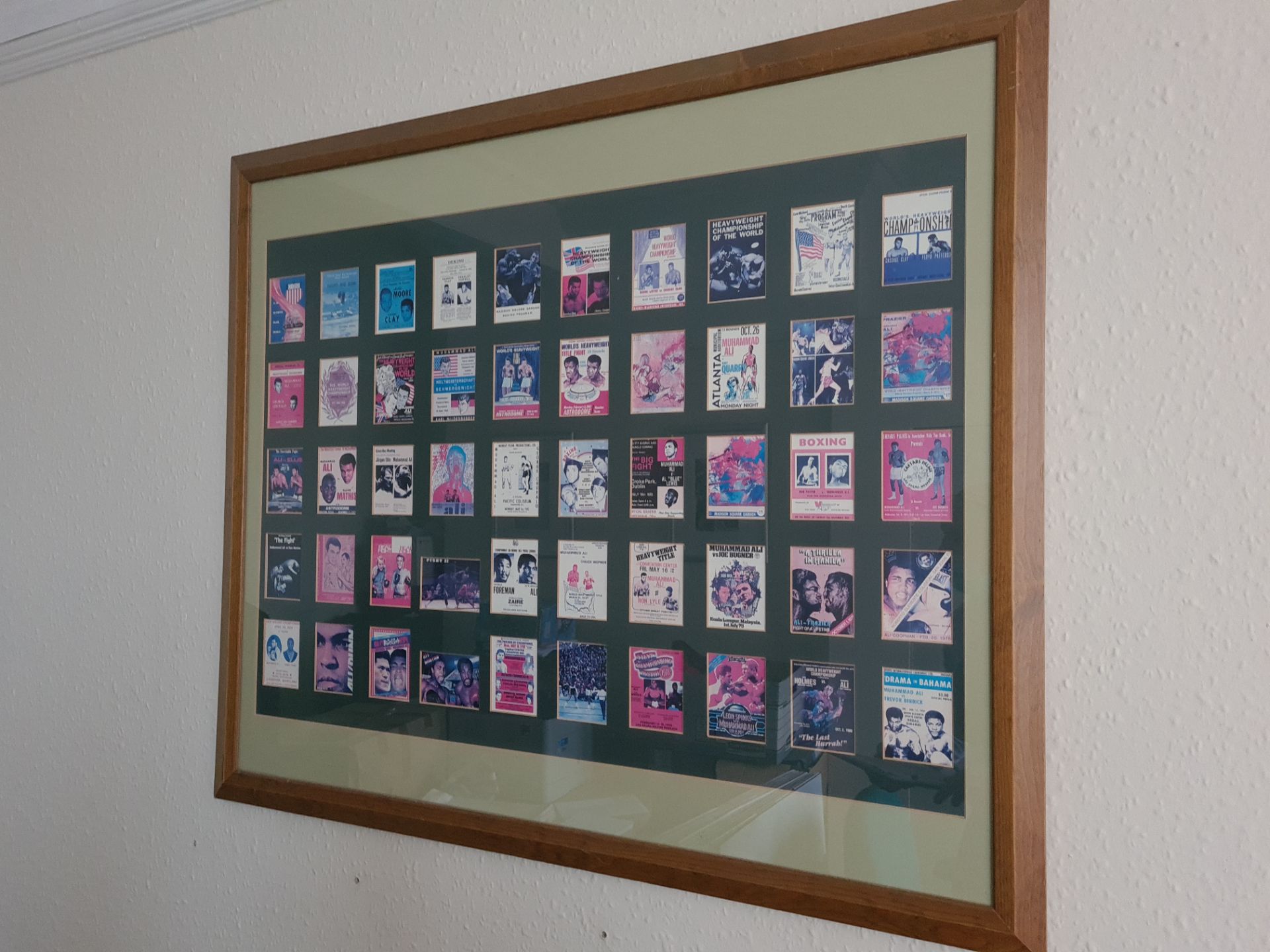 Framed Collection of 50 Boxing Fight Flyers for Cassius Clay / Ali, 30" x 36"