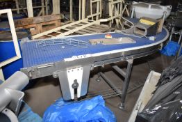 620mm wide Plastic Belt Radius Conveyor, understood to be manufactured by Intralox, approx. 4.2m