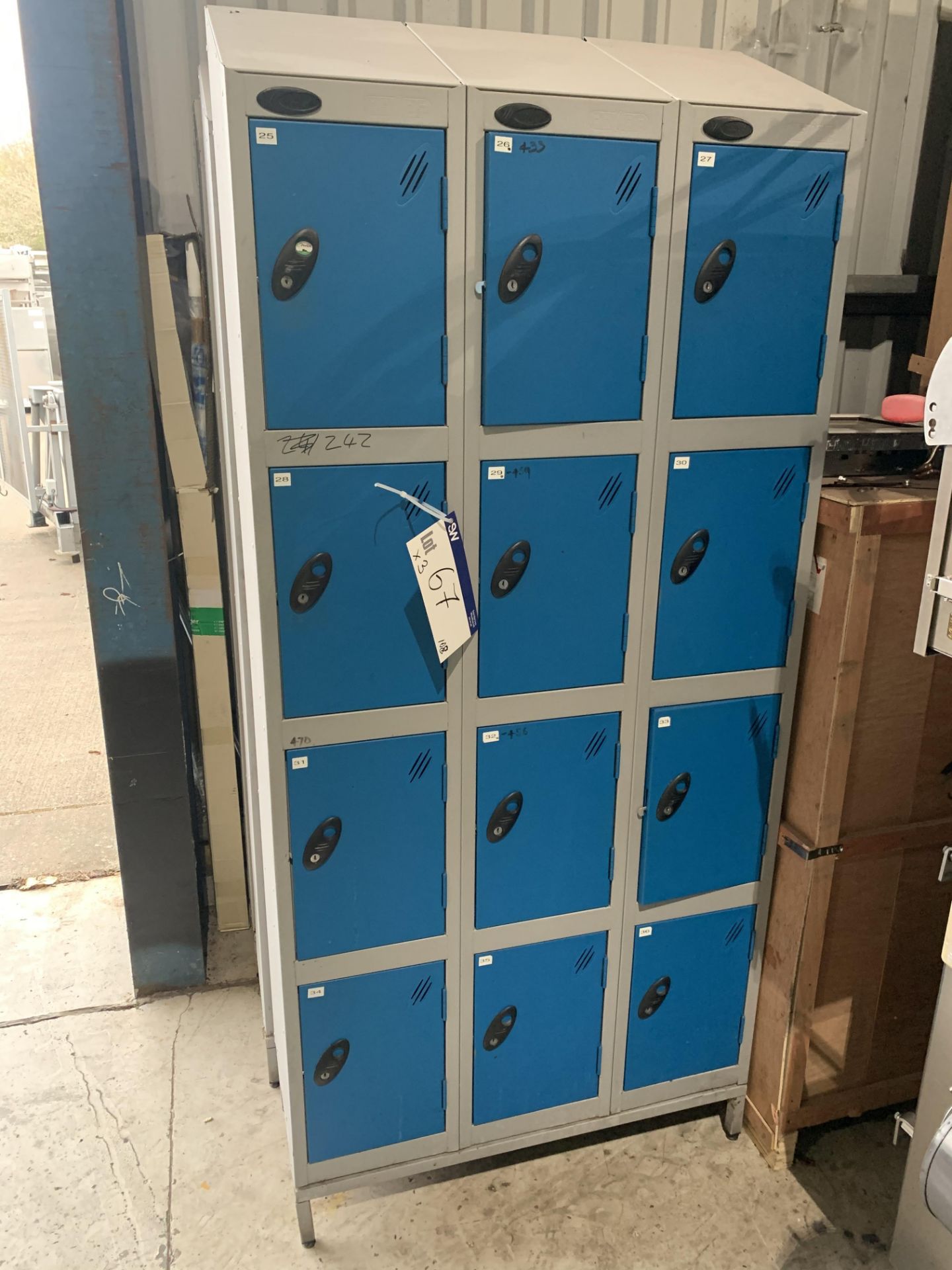 Three Twelve Door Lockers (no keys), approx. 0.92m long x 0.38m wide x 2.1m high, lift out