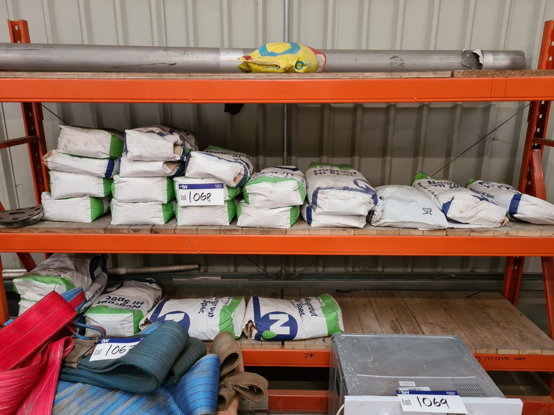 23 x 25kg NuGrout Hi Spec Grout, as set out on two shelves of rackPlease read the following