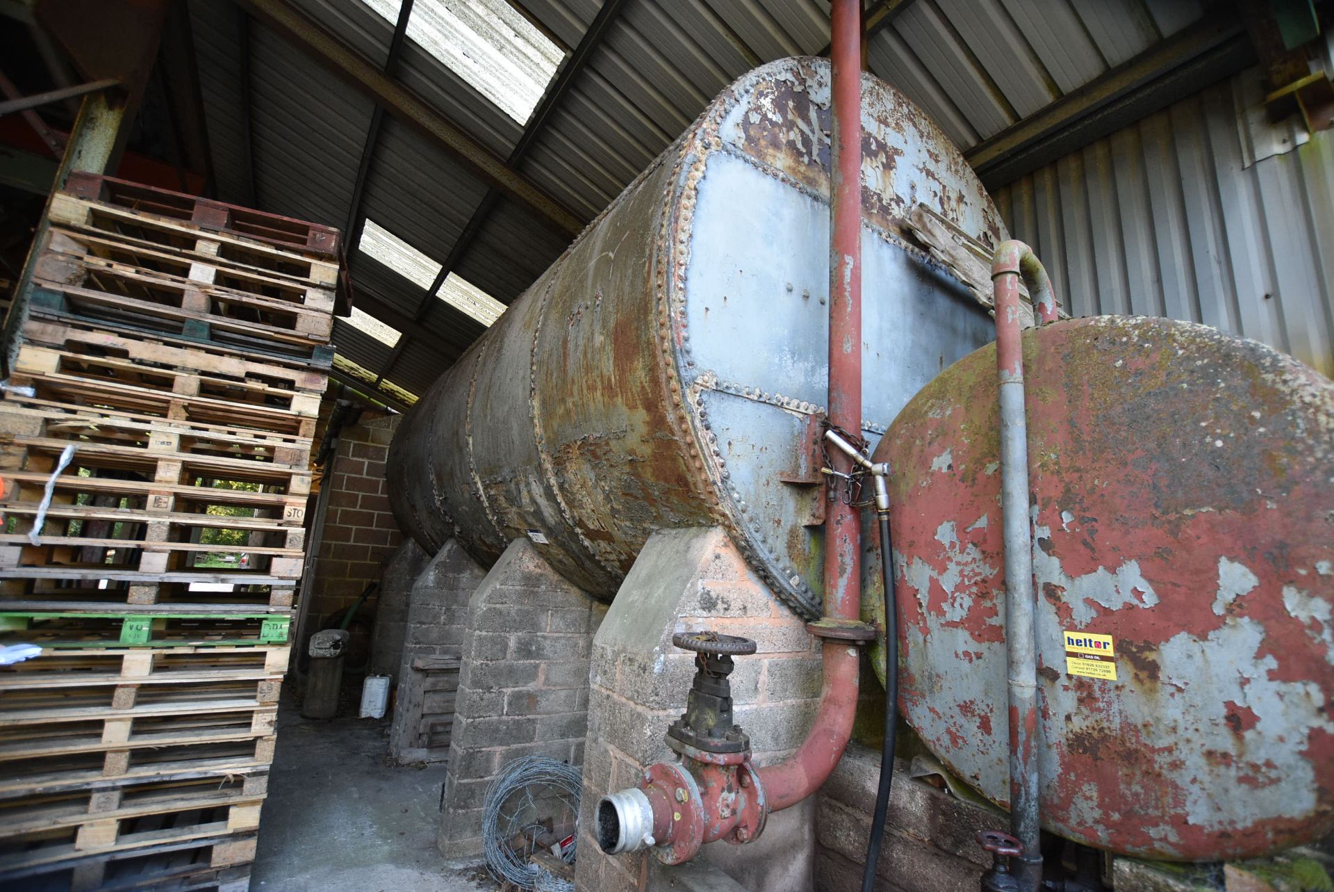 Horizontal Rivetted Molasses Storage Tank (understood to have a capacity of 45 tons), approx. 2.4m